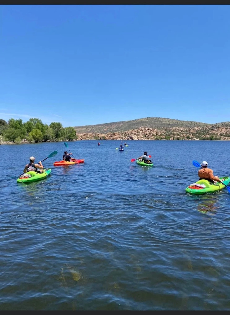 Men kayaking on a lake in northern Arizona